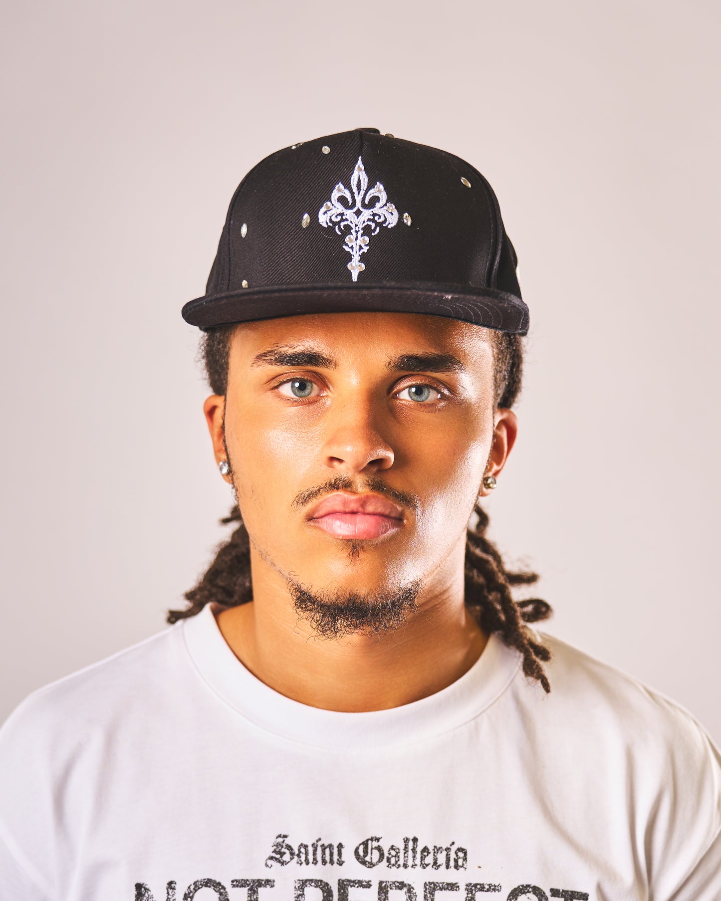 Sainted black JEWEL hat with hand-set gemstones by Saint Galleria — view 1