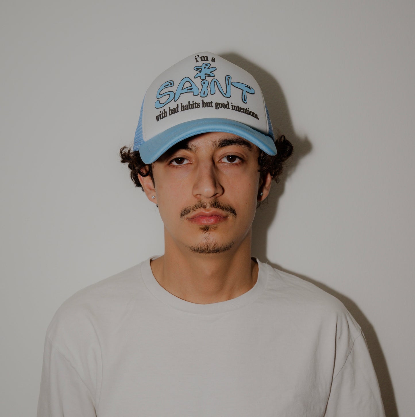 SAINT WITH BAD HABITS TRUCKER